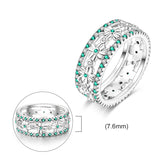 Bague en argent sterling avec de petites fleurs et des pierres turquoises.