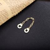 Bague menotte doré avec anneau en chaîne et les deux menottes à relier pour former la bague.