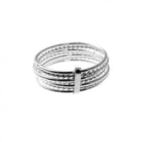 Bague semainier en argent 925 avec 7 nneaux fins collés.