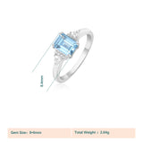 Bague topaze en argent 925 et un rai topaze bleu rectangulaire, avec ses dimensions.