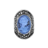 Camée bague en alliage de zinc avec un anneau à motif et une pierre bleue.