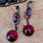 boucles d'oreilles fushia