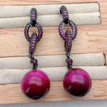 boucles d'oreilles fushia