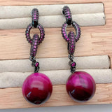 boucles d'oreilles fushia