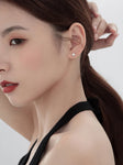 boucles d'oreilles asymétriques tendance