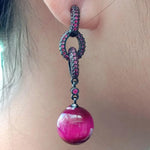 boucles d'oreilles fushia