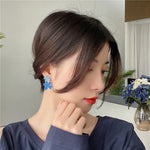 boucle d'oreille bleue