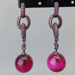 boucles d'oreilles fushia