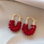 boucles d oreilles rouges