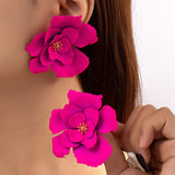 boucle d'oreille rose fushia