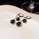 boucles d'oreille perle noire