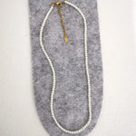 collier perle homme