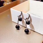 boucles d'oreille perle noire