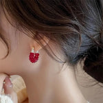 boucles d oreilles rouges