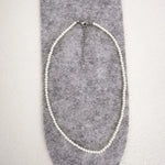 collier perle homme