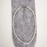 collier perle homme