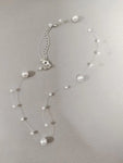 collier en perles blanches