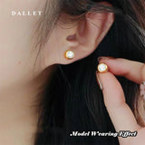 boucle d'oreille bebe or 18 carats