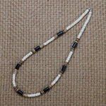 collier coquillage homme