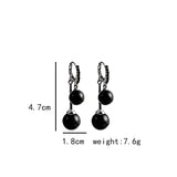 boucles d'oreille perle noire