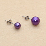 boucles d'oreilles violettes