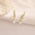 boucle d'oreille perle luxe