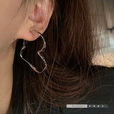 boucle d'oreille en forme de coeur