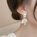 boucles d oreilles blanches