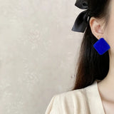 boucle d'oreille bleues