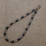 collier coquillage homme