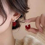 boucles d oreilles rouges