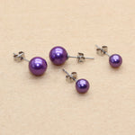 boucles d'oreilles violettes