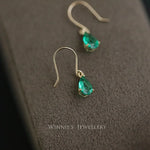 boucles d oreilles emeraude