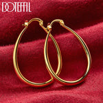 boucles d'oreilles or 24 carats