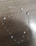 collier en perles blanches