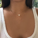 collier une perle blanche