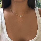 collier une perle blanche