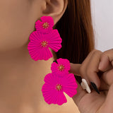 boucle d'oreille rose fushia