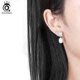 boucles d'oreille en nacre