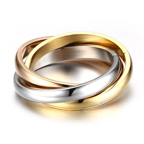 Bague 3 ors en acier inoxydable avec 3 anneaux, un doré, un argenté et un rose gold.