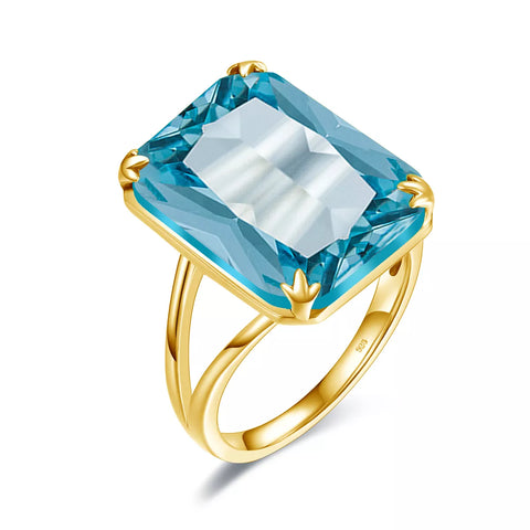 Bague aigue marine plaqué or jaune en argent 925 avec une pierre rectangle.