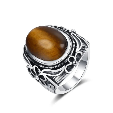 Bague ancienne en argent 925 avec une pierre ovale Oeil de Tigre et des motifs floraux.