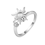 Bague anti stress femme avec un soleil rotatif et à taille réglable.