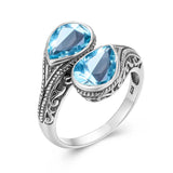 Bague argent 925 sterling avec deux aigue-marine en forme de goutte d'eau.
