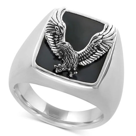 Bague en argent homme 925 avec pierre centrale noire et motif aigle.