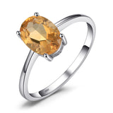Bague citrine en argent sterling 925 avec une citrine jaune ovale.
