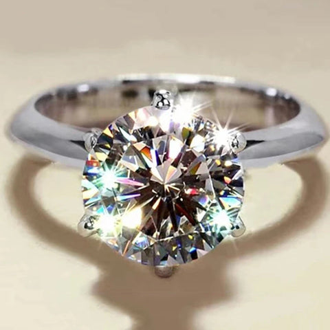 Bague de fiançailles pour femme en argent sterling 925, avec une pierre moissanite scintillante.