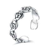 Bague de pied en argent 925 avec un anneau ouvert en forme de couronne de fleurs.