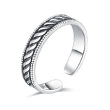 Bague de pied en argent sterling 925 avec un anneau orné de motifs torsadés.