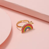 Bague fille 10 ans avec anneau doré et pendentif arc en ciel.
